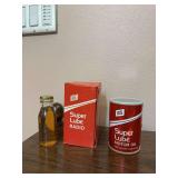 FS Superlube Motor Oil radio, appears to never have been removed from box/used and a bottle of Edison battery oil