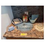 Glass rolling pin, refrigerator dish, nut grinder, butter dish, cookbooks, blue Fire King mixing bowl, etc