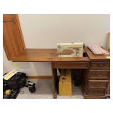 Viking Huskvarna sewing machine in cabinet and included notions Model 705H
