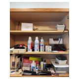 Two cupboards of office supplies