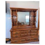 19D x 65L x 76H Owosso pine 8 drawer dresser with mirrored display top
