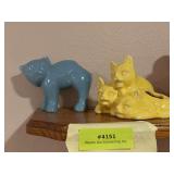 2 unmarked cat planters