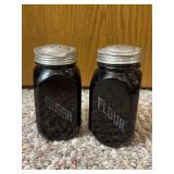 Black glass flour and sugar shakers