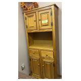 13D x 29L x 66H modern pine cabinet and fall wreath