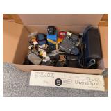 Universal tripod, Kodak Colorburst 250, Olympus 35, camera cases, flash, etc
