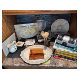 Cookbooks, knife sharpener, serving platter, relish tray, deviled egg platter, blender, etc