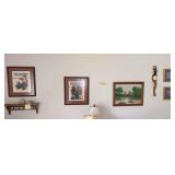 Artwork on wall of living room and hall