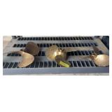 Three brass boat propellers