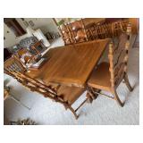 Kitchen table 42x66 and (2) 18” leaves with 6 chairs, captains chair has broken arm rest