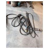 Assorted hydraulic hoses and snap couplings