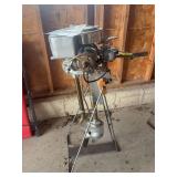Neptune outboard boat motor and stand, model OB35 A serial number D7 5461 cleaned up Not running