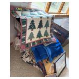 Bed linens, crafting books, quilted wall hanging, art, etc
