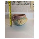 Roseville Art Pottery Peony jardiniere, specifically model #661-5. Design: Features a floral peony pattern in shades of yellow and pink with green highlights, typical of the Roseville line introduced 