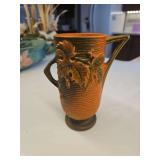 Roseville Pottery Bushberry handled vase in a terra cotta or russet glaze