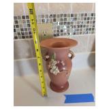 Roseville Apple Blossom, featuring a raised floral design and rustic branch-style handles