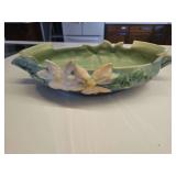 Roseville Pottery console bowl, likely from the 'Magnolia' or 'Clematis' line produced in the 1940s, featuring sculpted floral reliefs and green glaze. Chipped on handle