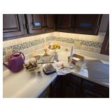 Napkin holders, candles, fruit decorations, CD's, kitchen towels, drying Mat