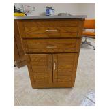 Cupboard on wheels with top that opens and plugins 25x20x36