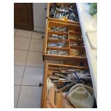 3 drawers of kitchen utensils, knives, silverware (Bring boxes to pack)