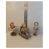 Vintage Goebel Hummel figurine known as the 'Globe Trotter' or 'Globe Trotter', specifically mold number HUM 79.  M.I. Hummel 'Practice Makes Perfect' figurine (Hummel #771).  Goebel Hummel figurine t