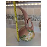 Roseville Pottery 'White Rose' ewer, specifically shape number 993-15 or similar 10-inch models introduced in 1940. Design: Features white rose blossoms with yellow centers against a dusty pink to gre