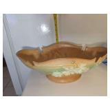 Roseville Pottery bowl, likely from the 'Cosmos' or 'Water Lily' pattern line, featuring relief-molded white flowers against a textured brown and green background