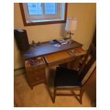 Desk with contents includes chair