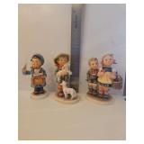 Vintage M.I. Hummel figurine titled 'To Market' or 'Home From Market', Model Number: HUM 49.  M.I. Hummel 'Shepherd's Boy' figurine, designated as model #64, which is a hand-painted porcelain collecti