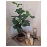 Candles and silk flower in pot