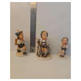 M.I. Hummel porcelain figurine known as the 'School Boy,  Model Number 82/2/0.  M.I. Hummel 'Little Goat Herder' porcelain figurine, identified as mold number 200/I.  Goebel M.I. Hummel figurine known