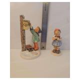 Goebel Hummel figurine titled 'A Letter to Santa Claus,' numbered Hum 340.  vintage Goebel M.I. Hummel figurine titled 'Daisies Don't Tell,' numbered Hum 380