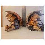 M.I. Hummel 'Umbrella Boy' figurine (Hum 152/A) and M.I. Hummel 'Umbrella Girl' figurine, specifically model #152/B/0