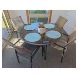 Table 48' and four chairs with flower, pot and placements