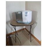 Small folding table with humidifier