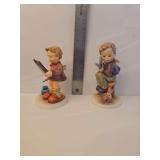 Goebel Hummel 'Little Tailor' figurine, identified by reference number HUM 308. Vintage Goebel Hummel figurine known as 'Art Critic' (model #318)