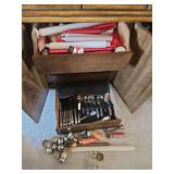 Wine Glasses, Community White Orchard Silverware, Napkins Holders, Candles, Candlestick holder (Bring Boxes to Pack) Find: in Bottom of China Hutch