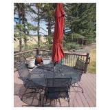 Wrought Iron Patio Table 54', four chairs and umbrella