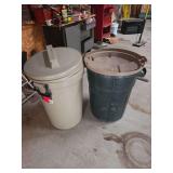 Two trash cans with lids