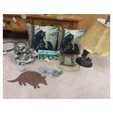 Rustic and western style decor, including bear pillows, fountain, fish lamp, armadillo metal cut out, etc.