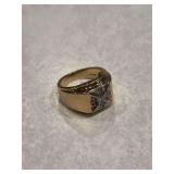 14K marked ring with center stone