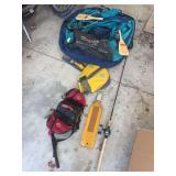 Stillwater float fishing raft, fishing pole, filet board, dog pack and life jacket