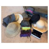 Hats and two pairs of sunglasses