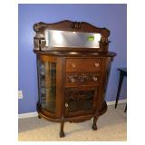 Antique sideboard cupboard with curved glass side doors, mirrored backsplash with candle rests, paw feet 16D x 40L x 52H