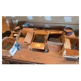 Boxes full of nails and a hammer