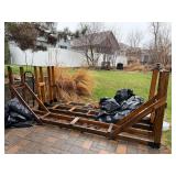 (2) approx 125” wood log racks **MULTIPLE SHOWN, YOU ONLY GET TWO. THEY MAY NOT BE THE ONES SHOWN IN PICTURE**