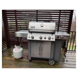 Weber Genesis II LP grill with two tanks and cover