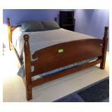 Bed frame made to fit queen mattress loosely, too snug for king mattress. Mattress, box spring and all linens included. This bed was made by Sellers father Solid and a beauty