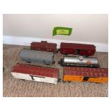 Six HO scale cars