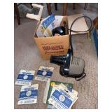 Viewmaster Junior projector and reels including Hopalong Cassidy, Gene Autry and Roy Rogers