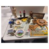 Collectibles as shown includes Route 66 clock, MWOT plate, GurnZGold picture, plastic lion, Hawkeye bottles, etc